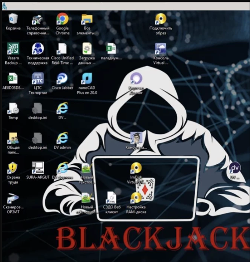 A defaced workstation showing a Blackjack image.