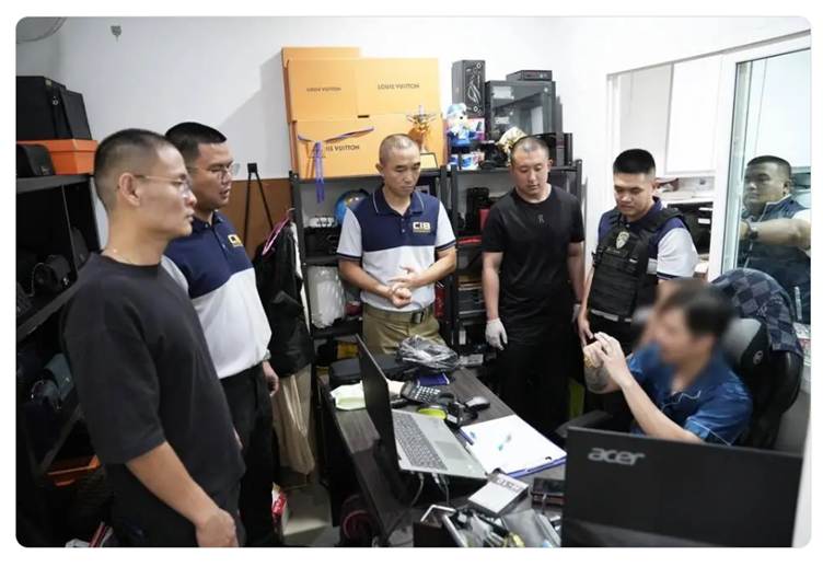 The Royal Thai Police raiding the cybercriminal’s premises.